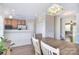 Open dining area flows into the kitchen with easy access to the outdoors at 139 High Ridge Rd, Mooresville, NC 28117