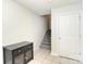 Bright entryway with tile floors, stairs, a closet, and access to the garage at 139 High Ridge Rd, Mooresville, NC 28117