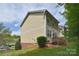 Back exterior of the home with a deck and siding, set in a grassy yard under a bright sky at 139 High Ridge Rd, Mooresville, NC 28117