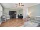 Open living room with hardwood floors, grey walls, and comfortable seating at 139 High Ridge Rd, Mooresville, NC 28117