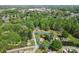Aerial view of the home on a wooded lot in a quiet neighborhood at 146 37Th Nw St, Hildebran, NC 28601