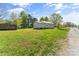 Expansive backyard with lush green grass and a small storage shed at 146 37Th Nw St, Hildebran, NC 28601