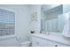 Clean bathroom with white cabinets, countertop, and modern fixtures at 1528 Half Pint Loop, Fort Mill, SC 29708