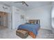 Comfortable bedroom featuring two windows and a vintage trunk at 1528 Half Pint Loop, Fort Mill, SC 29708