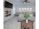 Bedroom sitting area with ceiling fan, sofa, chairs and wall mounted television at 1528 Half Pint Loop, Fort Mill, SC 29708