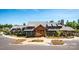 Stunning exterior view of community clubhouse featuring stone and wood accents at 1528 Half Pint Loop, Fort Mill, SC 29708
