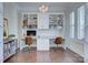 Bright home office with built-in shelves and desk, perfect for remote work and study at 1528 Half Pint Loop, Fort Mill, SC 29708