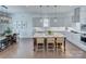 Open kitchen with a center island, stainless steel appliances, and modern pendant lighting at 1528 Half Pint Loop, Fort Mill, SC 29708