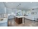 Modern kitchen with stainless steel appliances, center island, and ample counter space at 1528 Half Pint Loop, Fort Mill, SC 29708