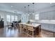 Large open kitchen featuring a center island with seating and a dining area at 1528 Half Pint Loop, Fort Mill, SC 29708