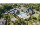 Aerial view of community amenities, including pool, tennis courts, and clubhouse at 19006 Brandon James Dr, Cornelius, NC 28031