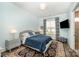 Cozy bedroom with a comfortable bed, stylish decor, and natural light at 19006 Brandon James Dr, Cornelius, NC 28031