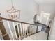 Grand foyer with a staircase, high ceilings, and decorative lighting fixtures at 19006 Brandon James Dr, Cornelius, NC 28031