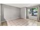 Bright bedroom with tile flooring, a window overlooking the street, and neutral colored walls at 194 Riverview Ter, Clover, SC 29710