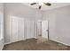 Bedroom featuring neutral walls and carpet with double-door closet at 194 Riverview Ter, Clover, SC 29710