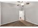 Bedroom featuring neutral walls and carpet with ensuite bathroom access at 194 Riverview Ter, Clover, SC 29710