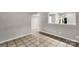 Dining room with tile flooring and view into the kitchen and an open living space at 194 Riverview Ter, Clover, SC 29710