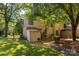 Charming home exterior with mature trees, American flag, and well-kept landscaping at 194 Riverview Ter, Clover, SC 29710