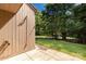 Home exterior with patio and lush trees offering a private outdoor space at 194 Riverview Ter, Clover, SC 29710