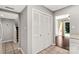 Hallway featuring tile flooring, a closet, and a view of the backyard through the sliding glass door at 194 Riverview Ter, Clover, SC 29710