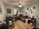 Cozy bedroom featuring a wood floor, crib, and unique wall decorations at 22 Heritage View Rd, Hickory, NC 28601