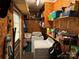 Well organized laundry room, with a washer, dryer, shelves, and extra storage space at 22 Heritage View Rd, Hickory, NC 28601