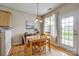 Bright dining area with a view of the backyard and access to the patio at 269 Tradition Way, Rock Hill, SC 29732