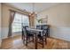 Elegant dining room with a chandelier, hardwood floors, and wainscoting details at 269 Tradition Way, Rock Hill, SC 29732
