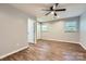 Bright bedroom with wood-look floors, and ceiling fan, offering a serene retreat at 2924 Parkway Ave, Charlotte, NC 28208