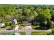 Aerial view of homes in a tree-lined neighborhood at 300 Cherry St, Belmont, NC 28012