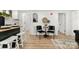 Cozy dining area with stylish decor and hardwood floors at 300 Cherry St, Belmont, NC 28012