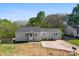 Well-maintained house featuring neutral siding, a modern roof, and a manicured yard at 300 Cherry St, Belmont, NC 28012