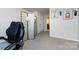 Bright bedroom featuring neutral walls, plush carpet, and stylish decor for a cozy and inviting atmosphere at 3100 Cheyney Park Dr, Charlotte, NC 28269