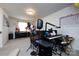 Versatile living room with musical instruments, offering a unique space for creative expression and entertainment at 3100 Cheyney Park Dr, Charlotte, NC 28269