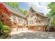 Spacious driveway leads to a home with multiple garages and attractive siding at 3201 Oak Brook Dr, Waxhaw, NC 28173