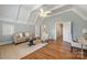 Bright, stylish living room with hardwood floors and neutral decor at 3201 Oak Brook Dr, Waxhaw, NC 28173