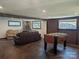 Finished basement features a foosball table and stone fireplace at 351 Glenwood Dr, Mooresville, NC 28115