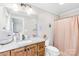 Bathroom vanity with a granite countertop, wood cabinets, and a toilet at 401 Yorkfield Dr, Shelby, NC 28150