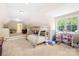 Bedroom with bunk beds and a play area with a dollhouse and various toys at 401 Yorkfield Dr, Shelby, NC 28150