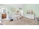 Bedroom with white furniture, light green walls, and a cozy atmosphere at 401 Yorkfield Dr, Shelby, NC 28150