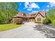 Beautiful home featuring a spacious driveway, a garage, and attractive stone accents at 401 Yorkfield Dr, Shelby, NC 28150