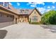 Charming stone and siding home exterior with a spacious driveway, two-car garage, and lovely curb appeal at 401 Yorkfield Dr, Shelby, NC 28150