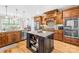 Well-equipped kitchen featuring custom cabinets, an island and granite countertops at 401 Yorkfield Dr, Shelby, NC 28150