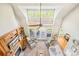 An aerial view of a living room featuring a fireplace, large windows and comfortable furniture at 401 Yorkfield Dr, Shelby, NC 28150