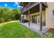 Covered patio area featuring a built-in grill, and easy access to both the backyard and indoor spaces at 401 Yorkfield Dr, Shelby, NC 28150