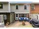 Cozy backyard patio with a fire pit and outdoor seating at 4605 Hedgemore Dr # I, Charlotte, NC 28209