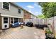 Spacious backyard featuring a fire pit, seating, and room for gardening at 4605 Hedgemore Dr # I, Charlotte, NC 28209