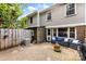 Cozy brick patio with outdoor seating and a fire pit, perfect for entertaining and relaxing in style at 4605 Hedgemore Dr # I, Charlotte, NC 28209