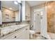 Bathroom featuring granite countertop, tiled floor, and a shower behind a shower curtain at 4607 Hedgemore Dr # H, Charlotte, NC 28209