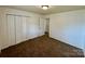 The bedroom has carpet and a double door closet with fresh paint at 4623 Monmouth Dr, Charlotte, NC 28269